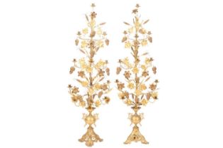 A pair of late 19th century Continental gilt metal ecclesiastical 13-sconce candelabras, with leaf