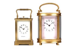 An early 20th century French brass carriage clock, retailed by J.E. Caldwell & Co. of