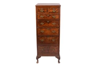 A "Mid Century Vintage" burr walnut veneered "Queen Anne" style pedestal chest of two short over