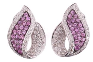 A pair of diamond and pink sapphire earrings, each earring in an organic foliate design pave set
