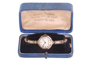 A Rolls 1920s lady's dress watch, featuring a signed hand-wound movement in a yellow metal case