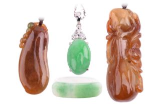 A small collection of Chinese carved jade jewellery; including a carved jade pendant with auspicious