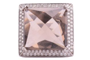 A smokey quartz and diamond cocktail ring, set with a large square faceted smokey quartz surround by