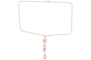 A pearl and diamond lavaliere pendant of foliate design, with two cultured pearls suspended along