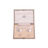 A gentleman's diamond and mother of pearl dress set, comprising cufflinks, buttons, and dress