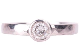 A diamond solitaire ring, set with a round brilliant cut diamond with an estimated weight of 0.50ct,