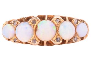 An opal five stone half hoop ring, set with a graduated row of five round cabochon opals in claw