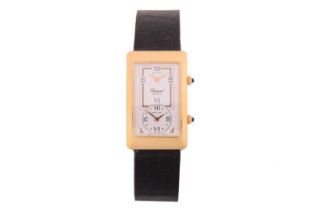 A Chopard Dual Time 18k Gold Quartz Wristwatch Model: 2240 Serial: 369105 Year: Approx 1990's Case