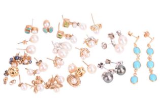 A collection of mostly pearl earrings, including a pair of 18ct white gold double pearl drop