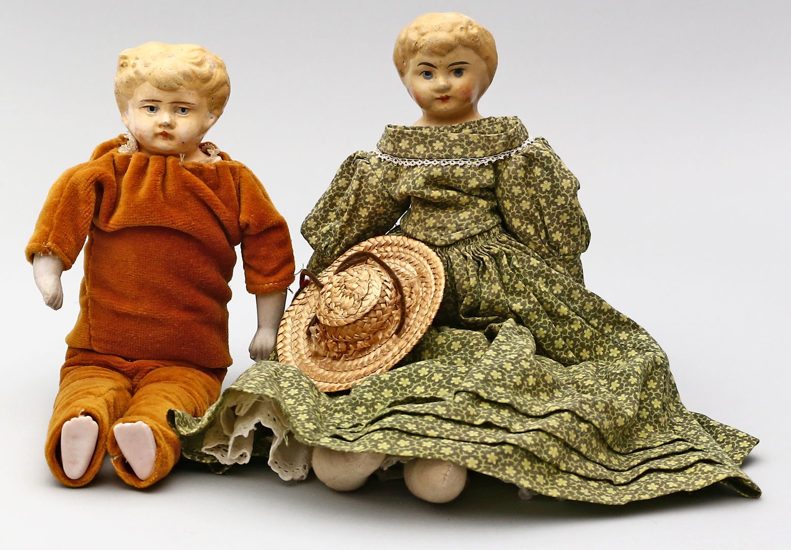 2 Biedermeier-Miniatur-Puppen.