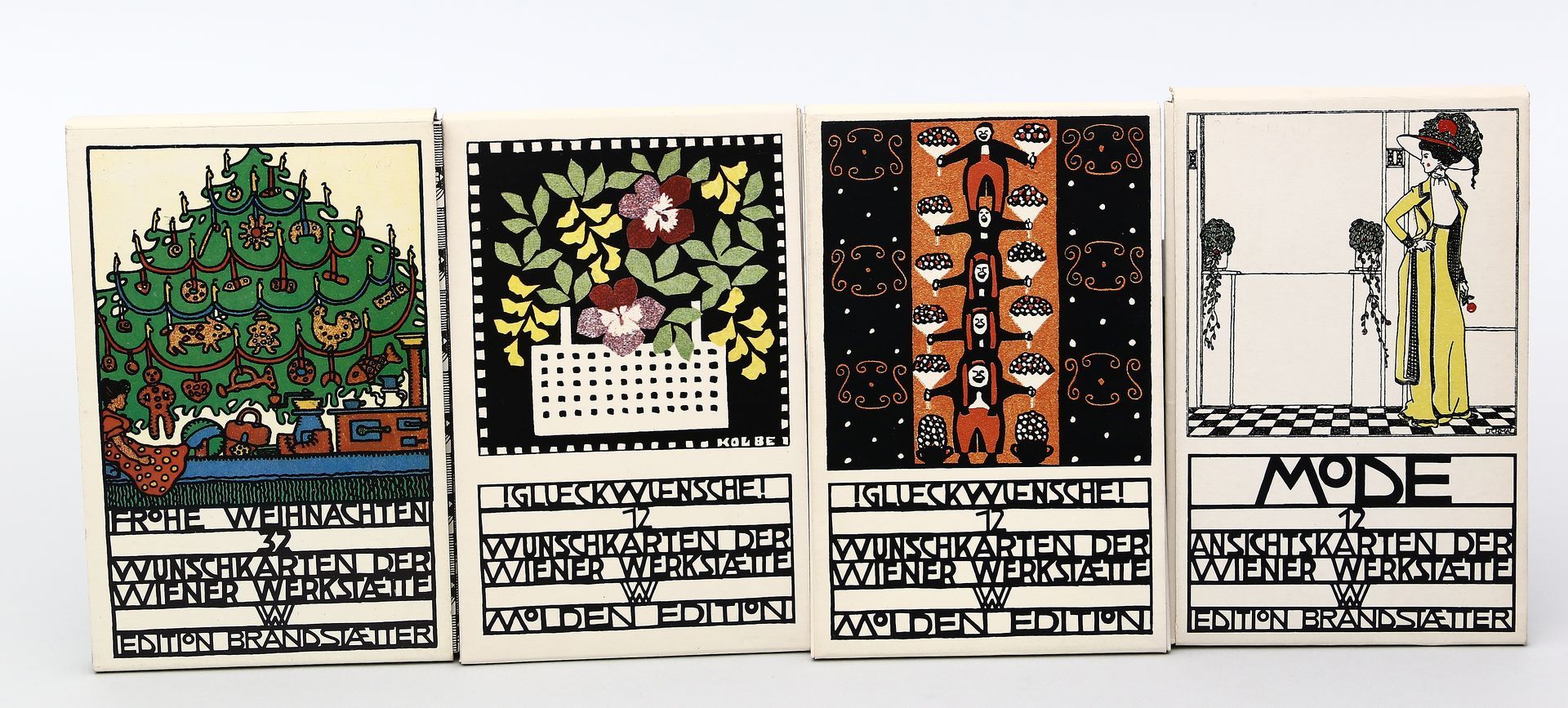 4 Umschläge mit Wunsch- und Ansichtskarten der Wiener Werkstätte.