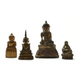 Lot van 4 zittende Boeddha's