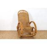 Rotan vintage schommelstoel.