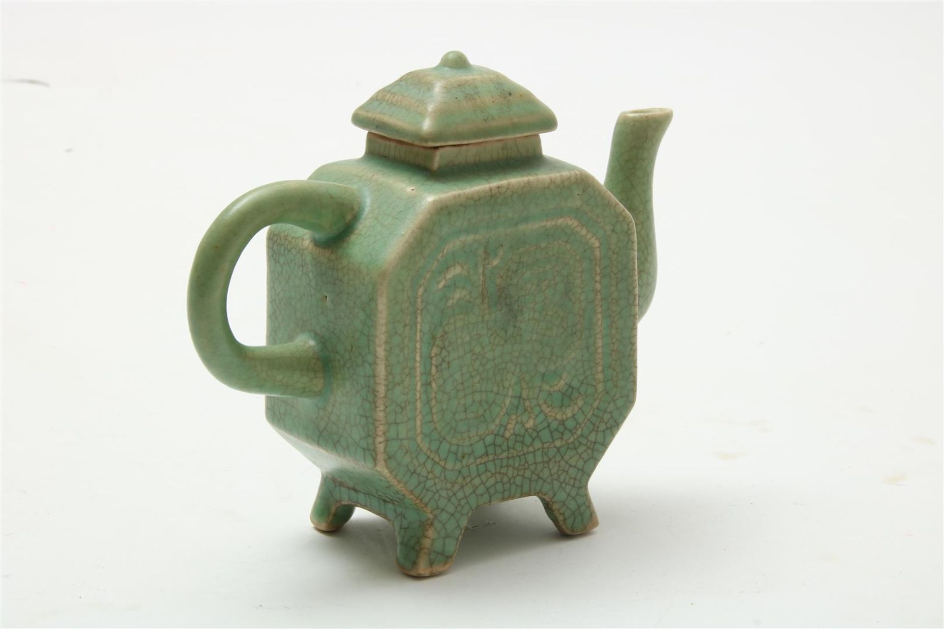 Porcelain teapot with celadon glaze and relief decor, 19th/20th century, h. 15 cm. - Image 2 of 3