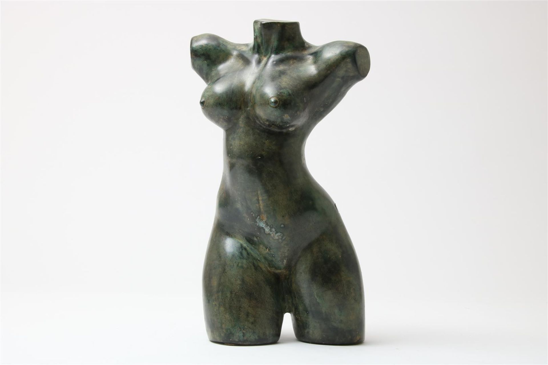 Bronze sculpture of a woman's torso, h. 42cm.