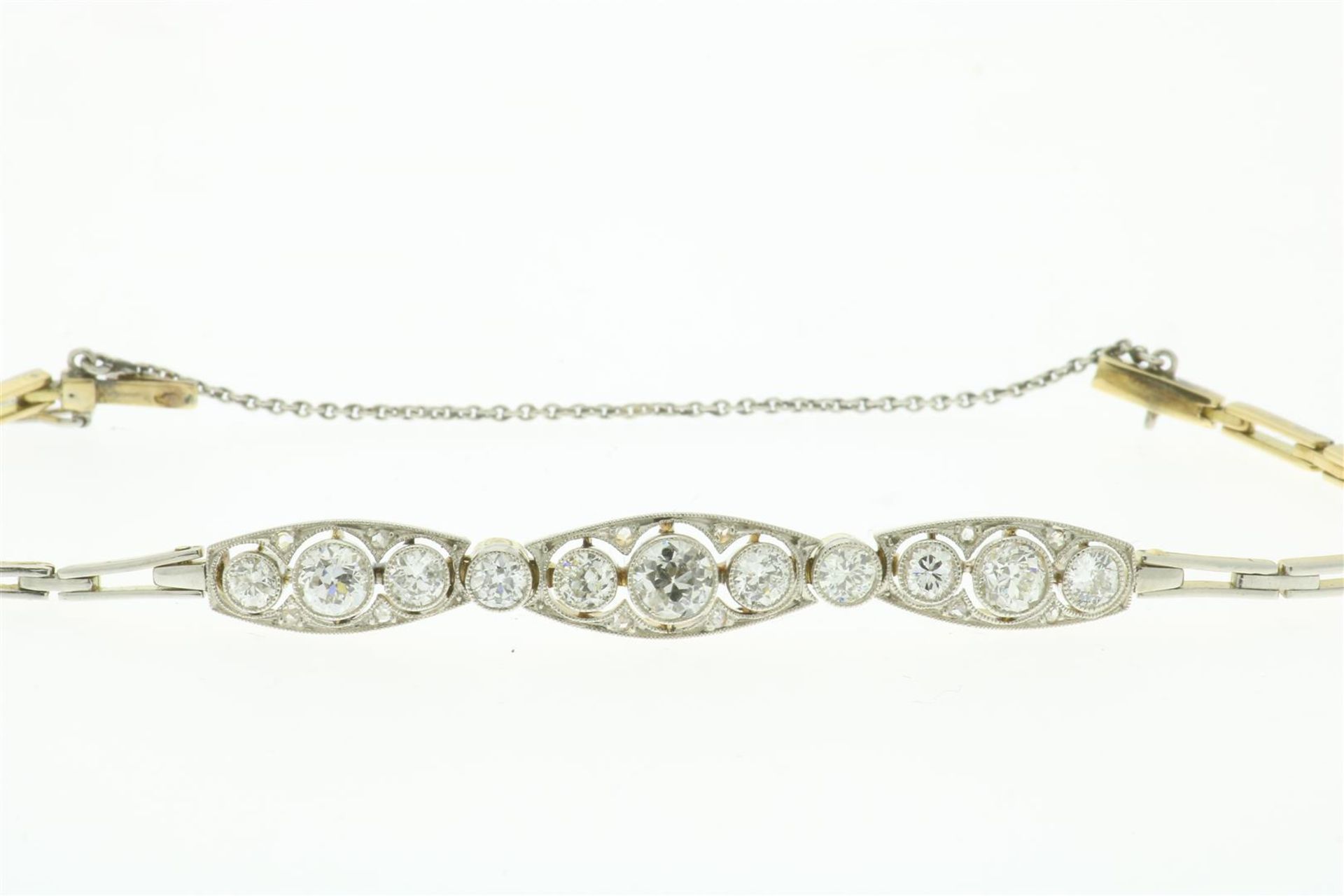 Bicolor gold Art Nouveau bracelet set with diamonds approx. (6 x 0.12, 2 x 0.27, 1 x 0.30, 12 x 0.