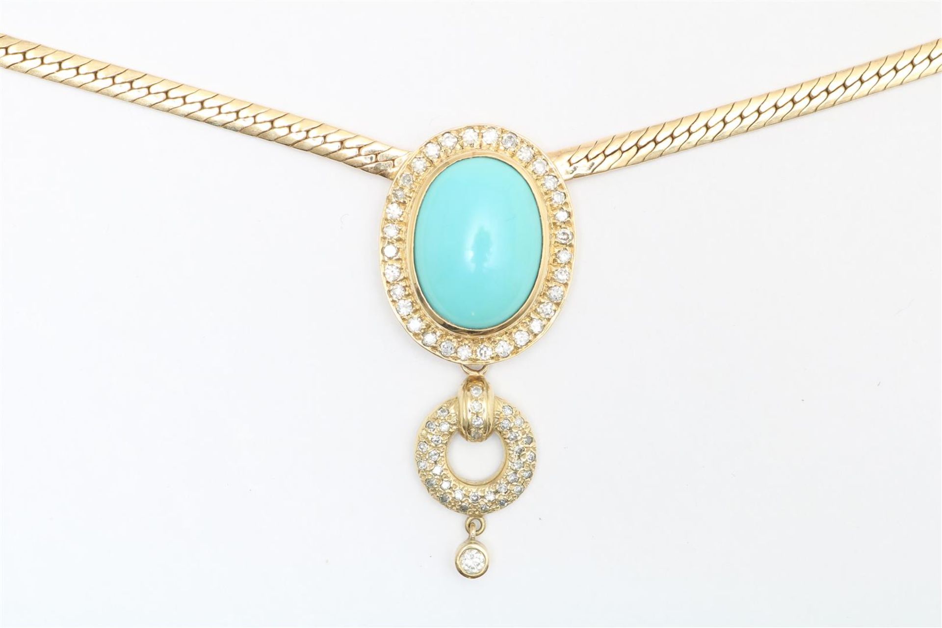 Gold necklace with a pendant set with turquoise and diamonds