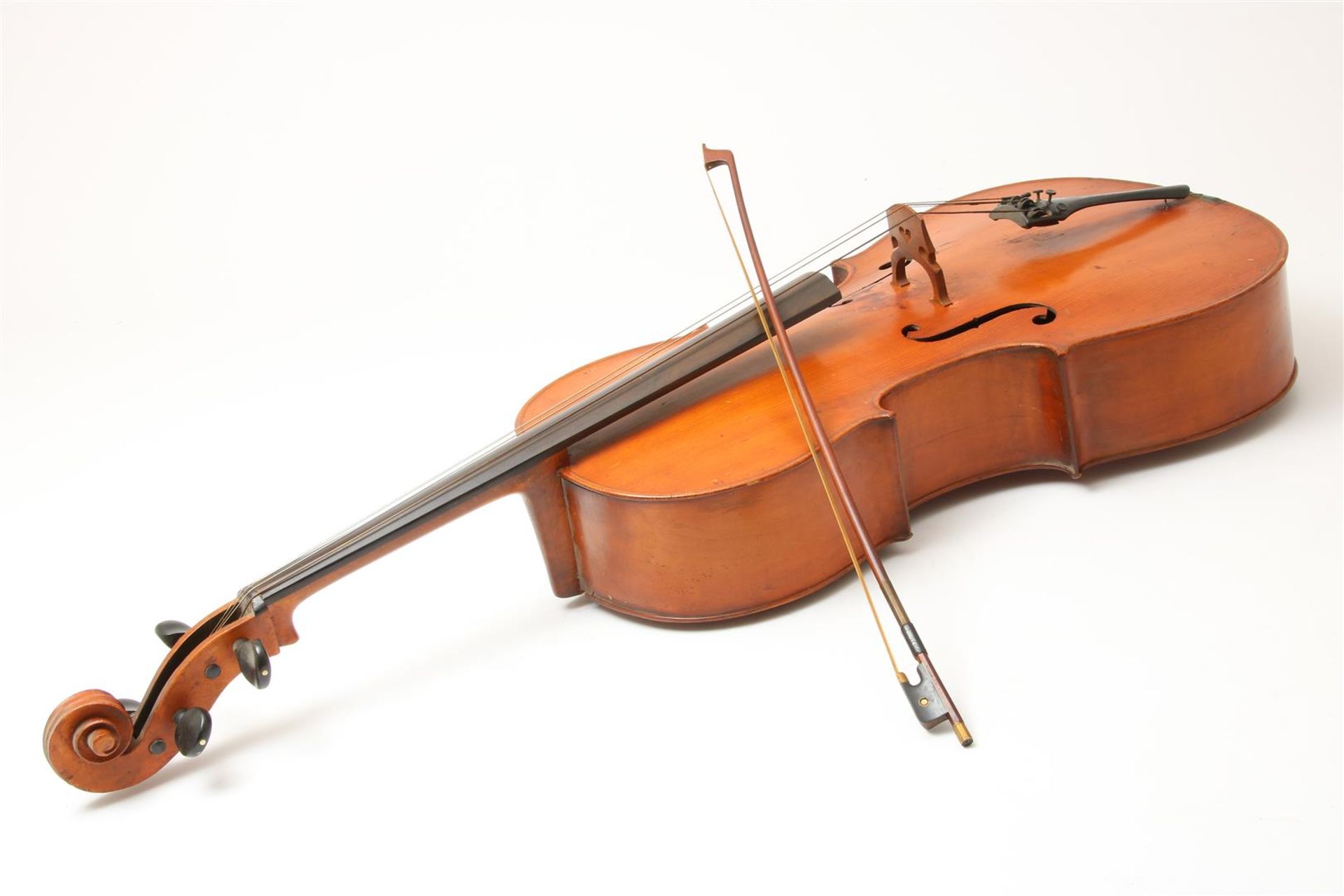 Wooden cello with bow