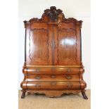 Oak Louis XV cabinet with carved ornament in double curved hood