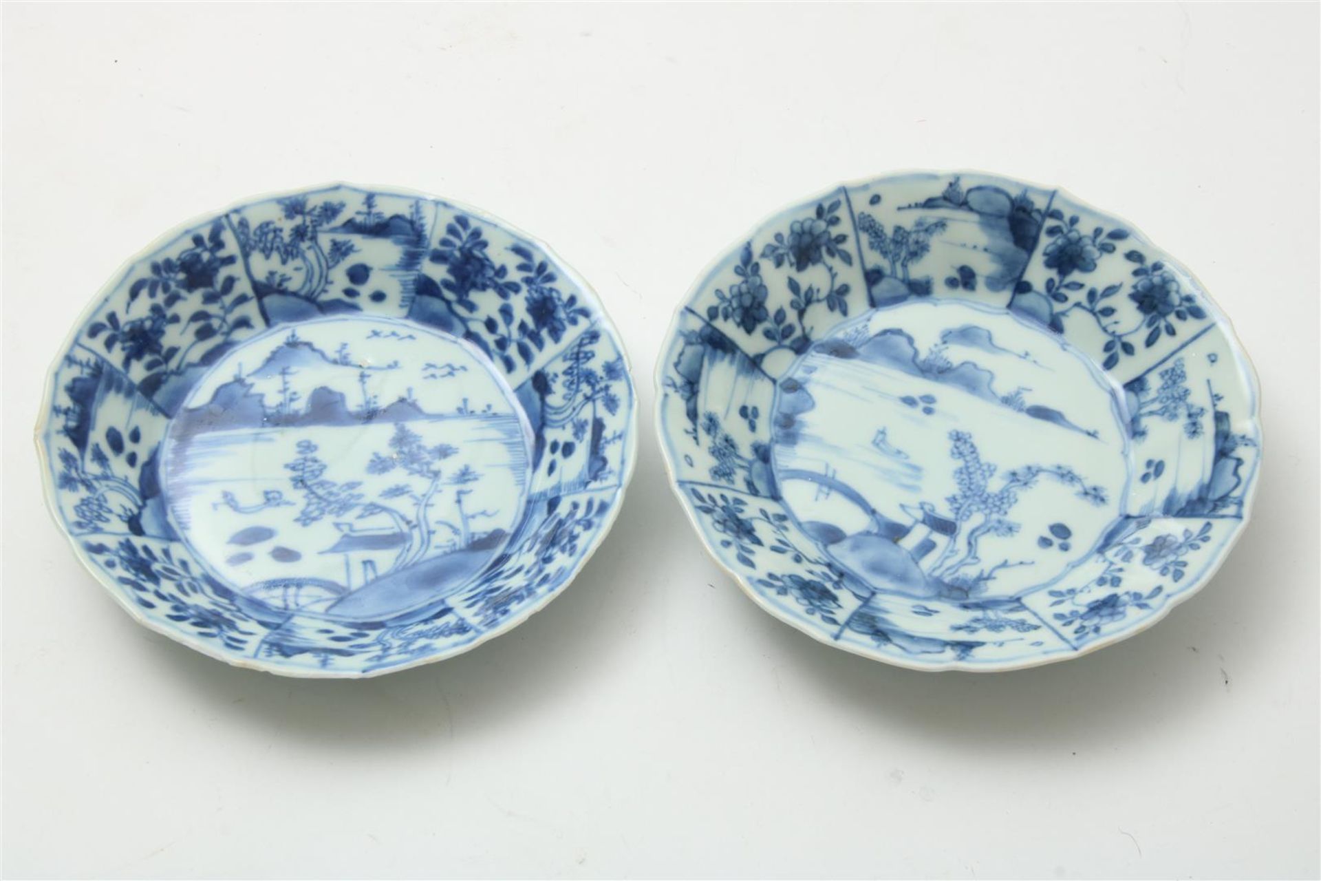 Set of kraak porcelain dishes, Wanli, decorated in blue with landscapes, diam. 13.5cm. (hairline,