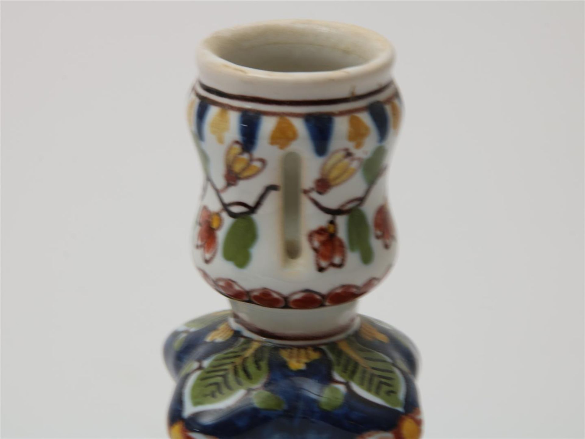 Lot of a polychrome earthenware candlestick, h. 21 cm., polychrome earthenware tea caddy, h. 13 - Image 8 of 9