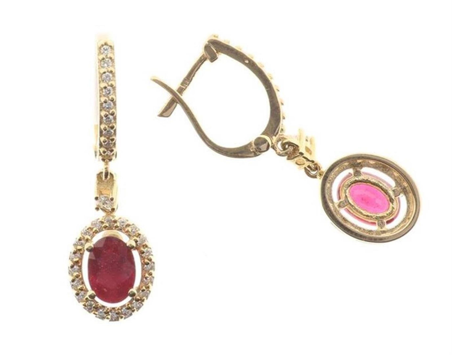 Rose gold earrings with rubies and diamonds