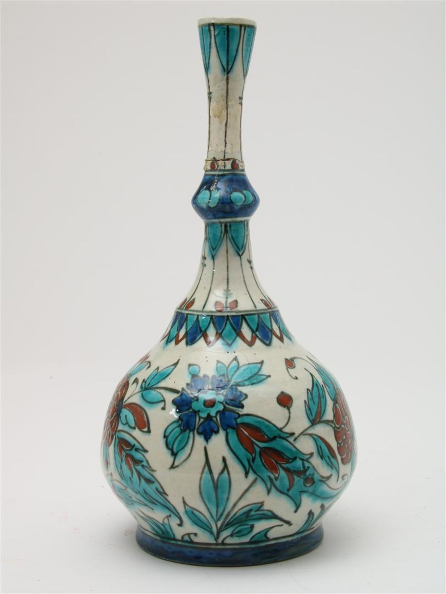 Polychrome earthenware 'New Delft' or 'Iznik' vase with narrow neck and Persian flower decor.