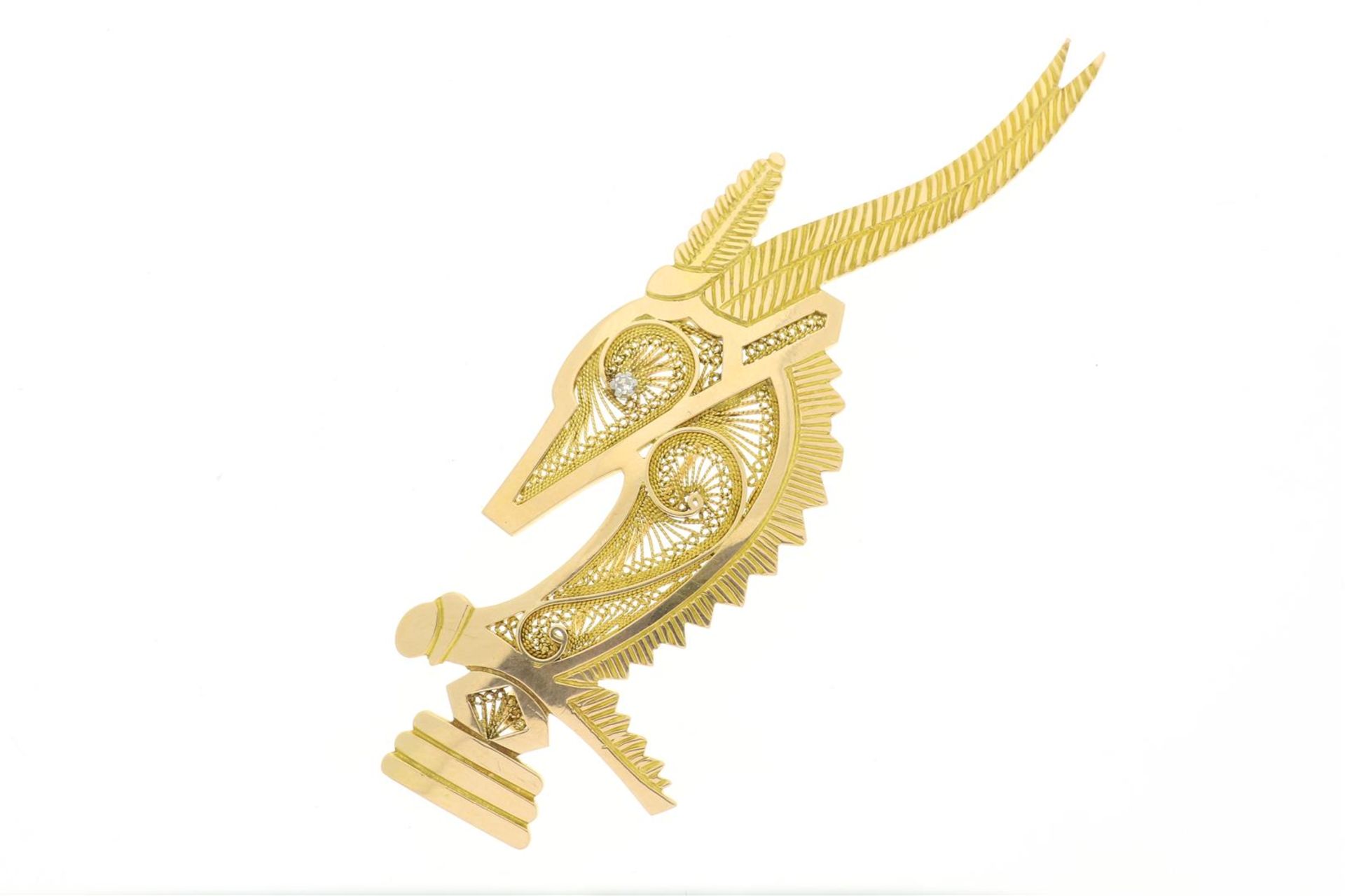 Yellow gold brooch with diamond