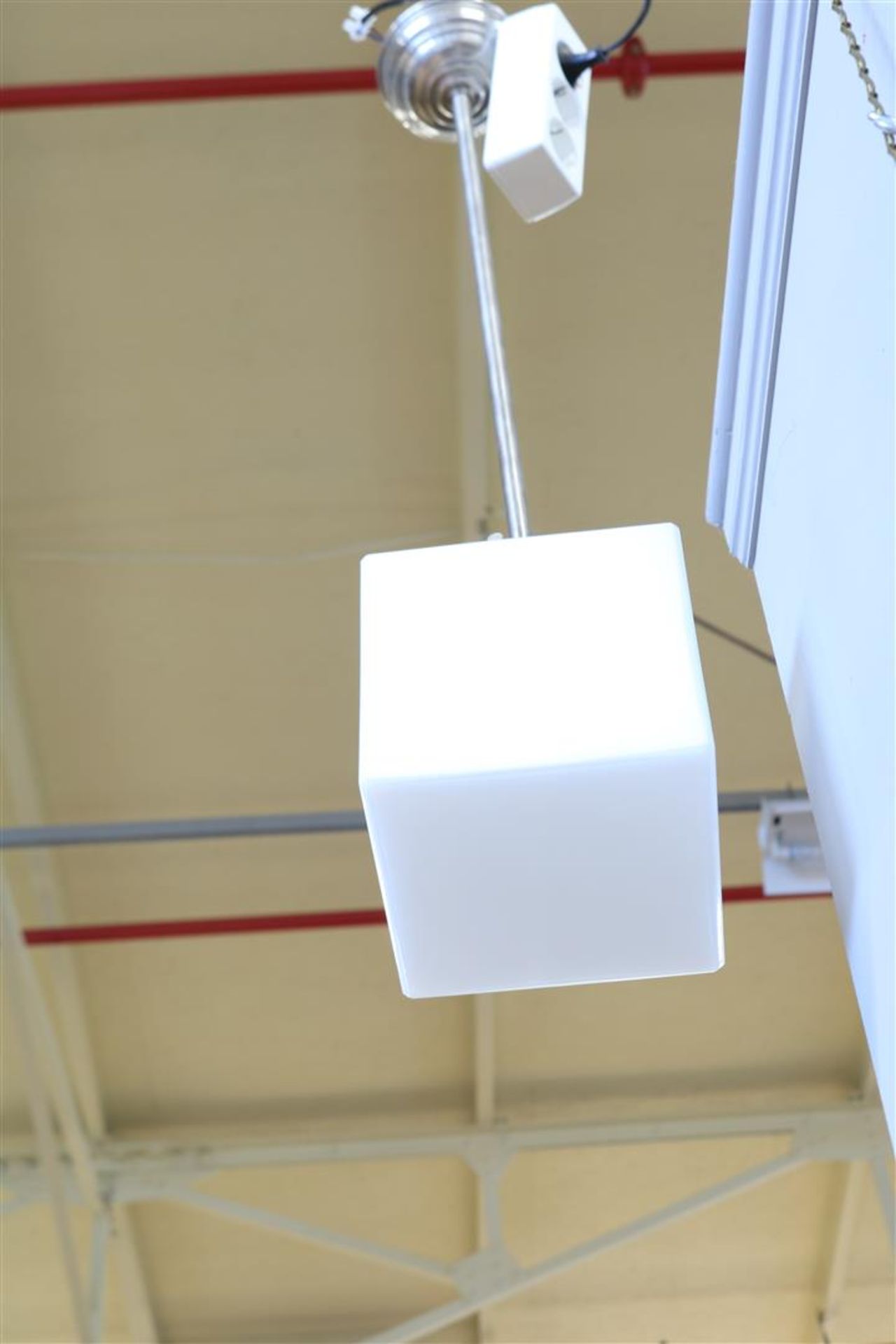 Chromed Gispen-style single-light hanging lamp with opaline cube shade, h. 80 cm.