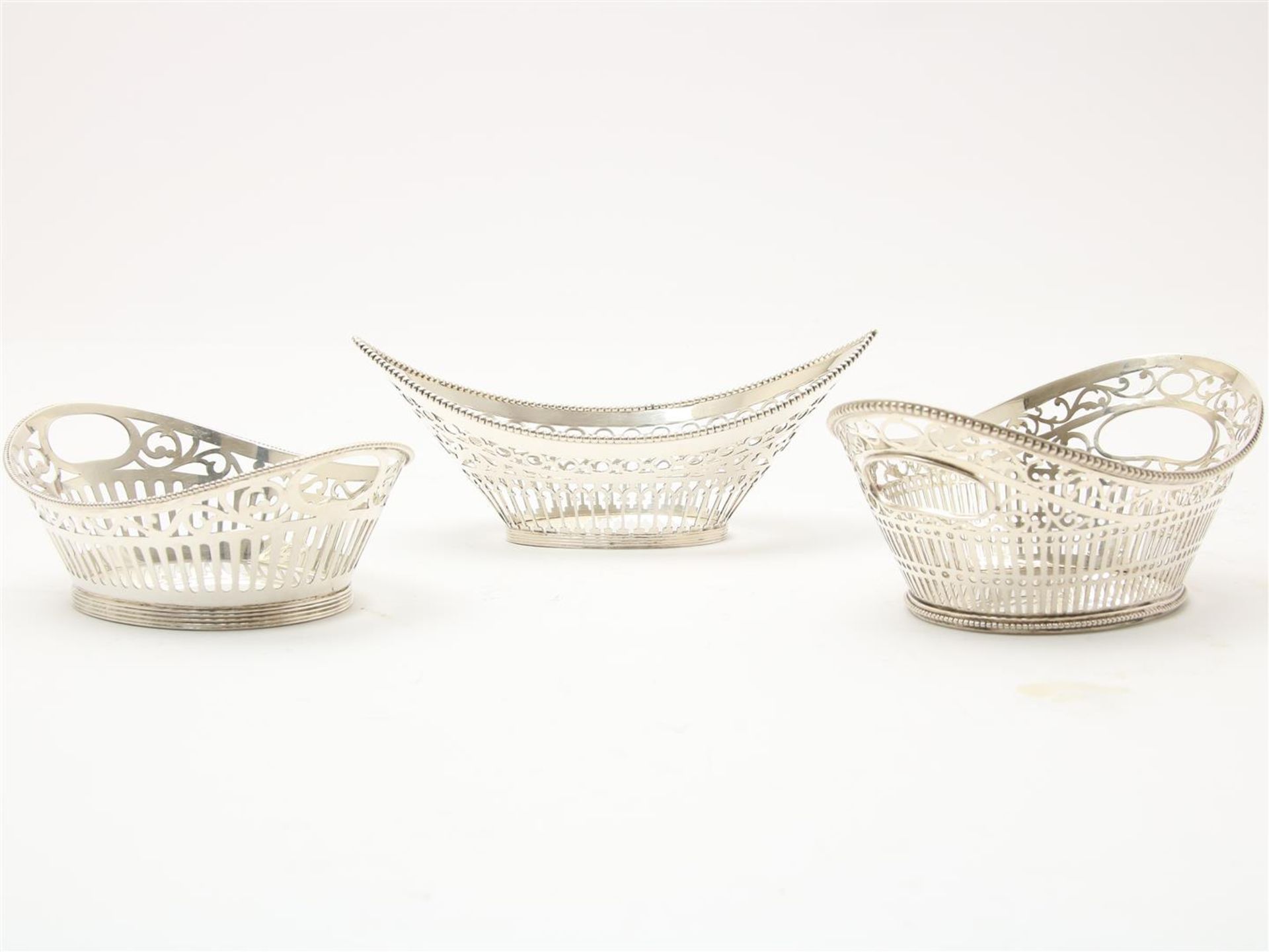 Three silver baskets