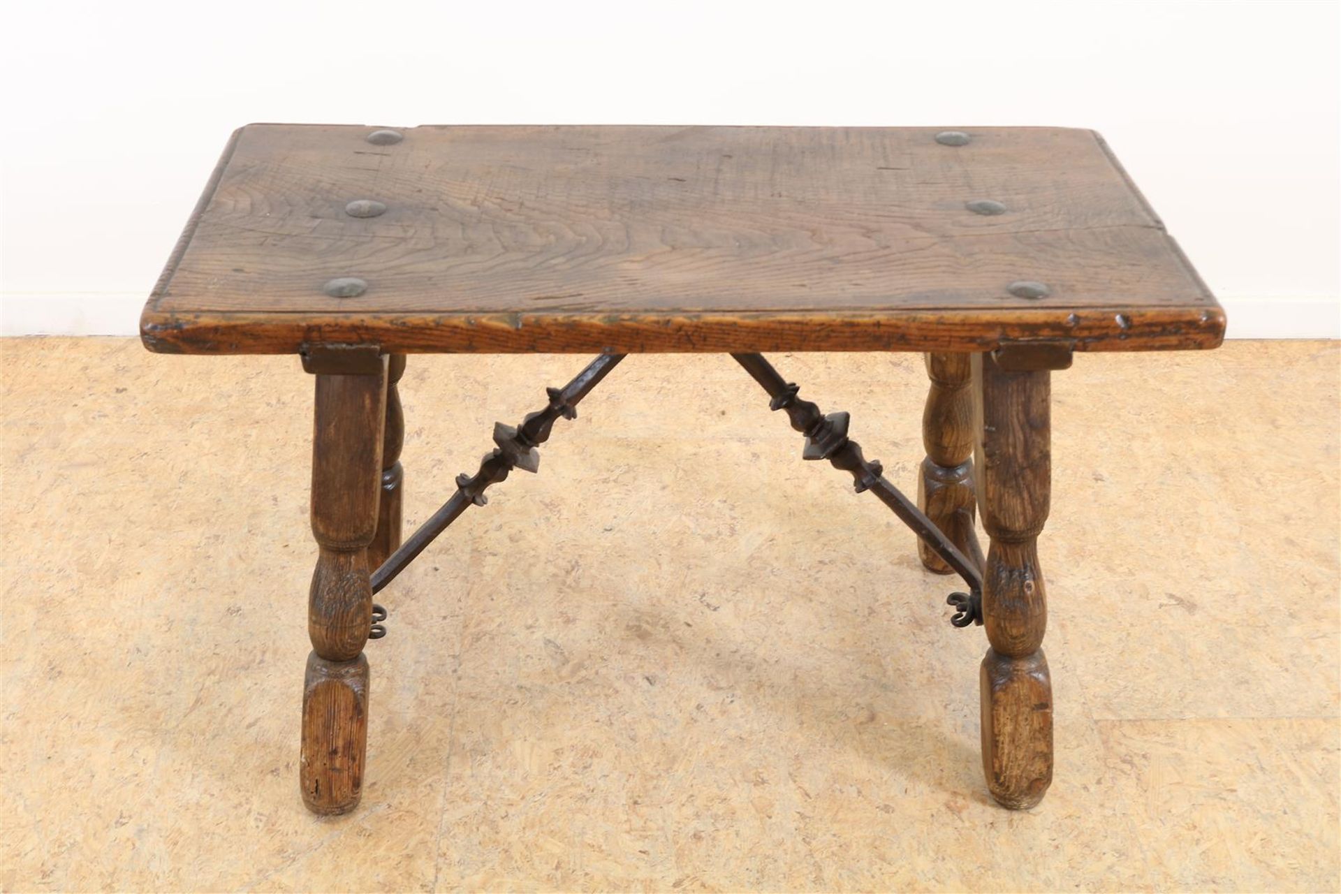 Chestnut wood table with wrought iron connections, Spain late 17th century, h. 48, w. 80, d. 40