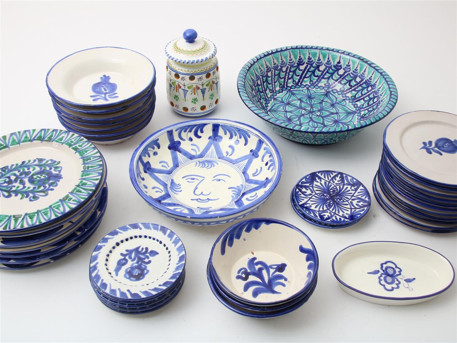 39 pieces of earthenware glazed tableware, largely marked Los Arrayanes Granada, Spain, including