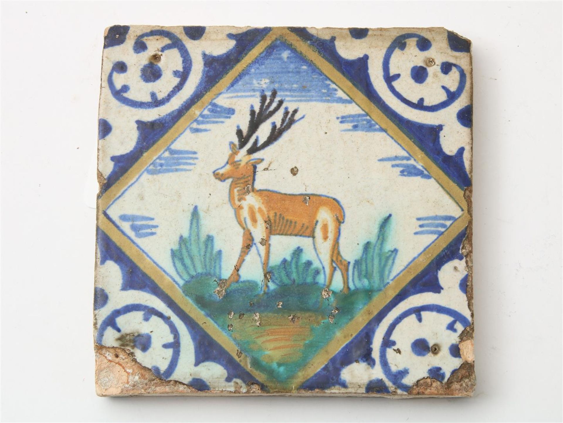 Four polychrome painted majolica square tiles: rider on horseback, soldier, deer and dog, circa - Image 2 of 5