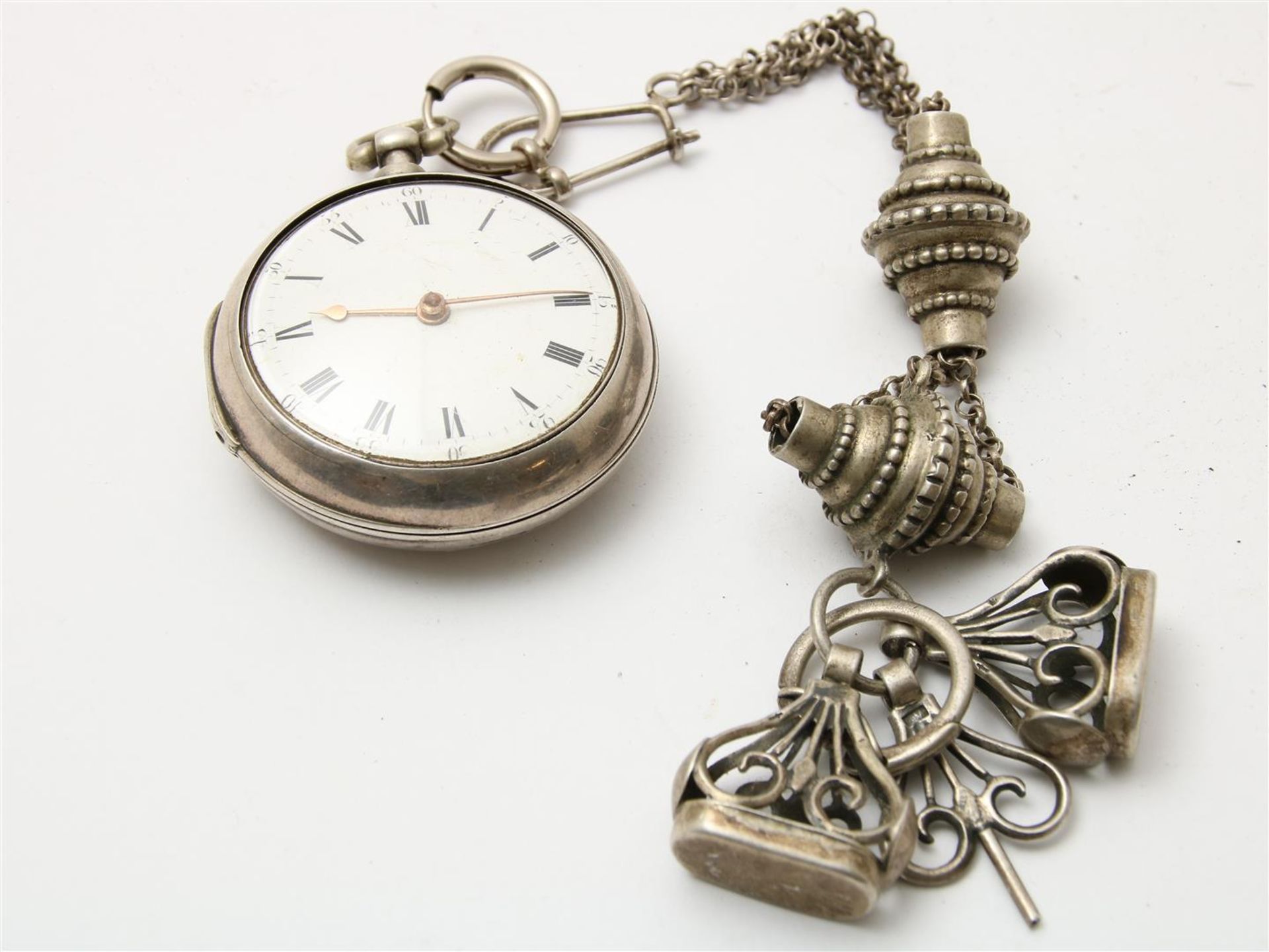 Silver pocket watch with silver chatelaine, probably England.