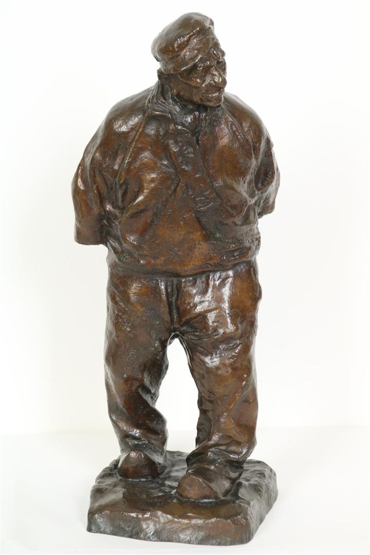 "Charles" Henri Marie van Wijk (1875-1917) Bronze figure of a walking farmer with hand on his