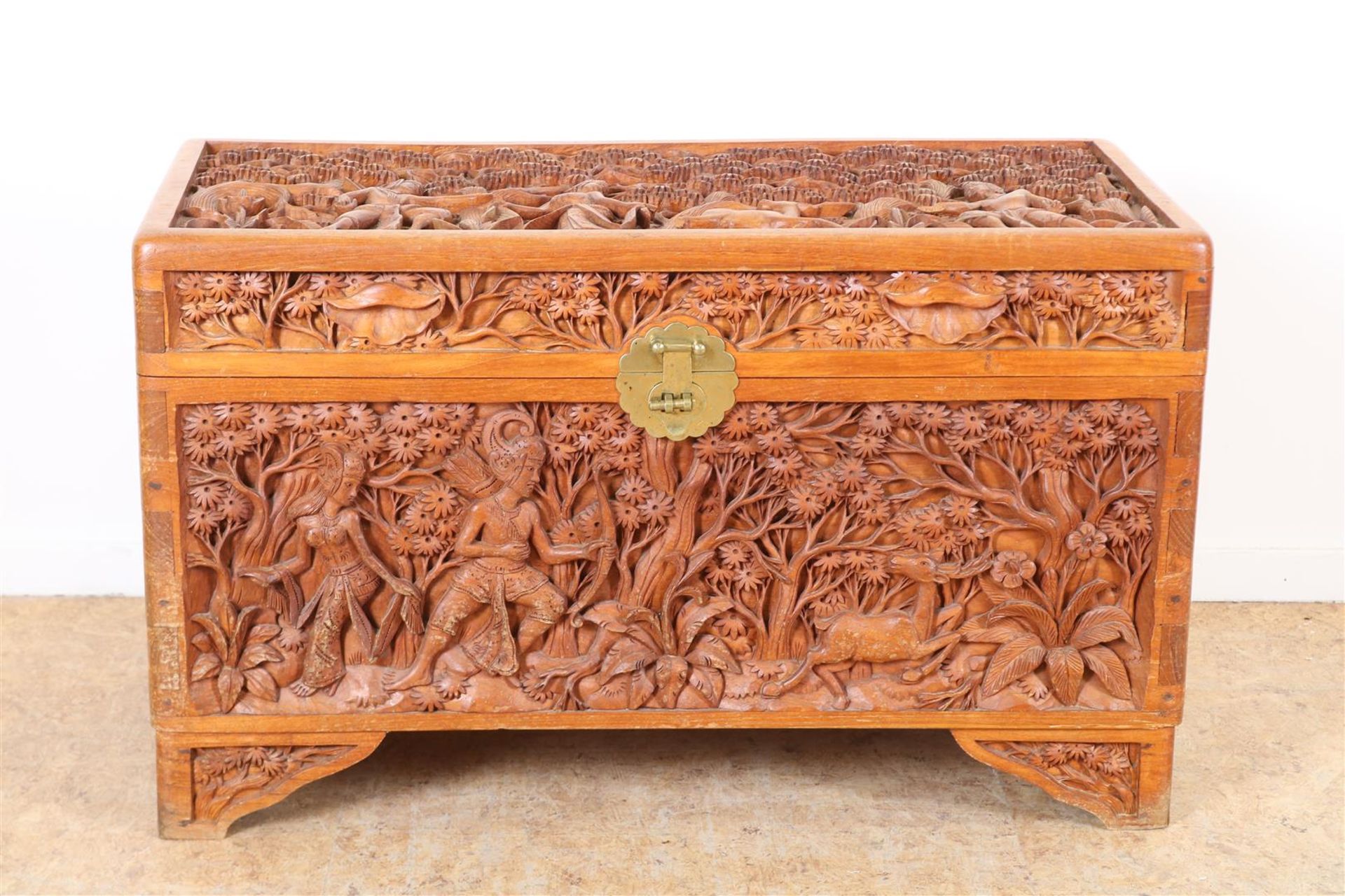 Camphor box with relief carved decor 