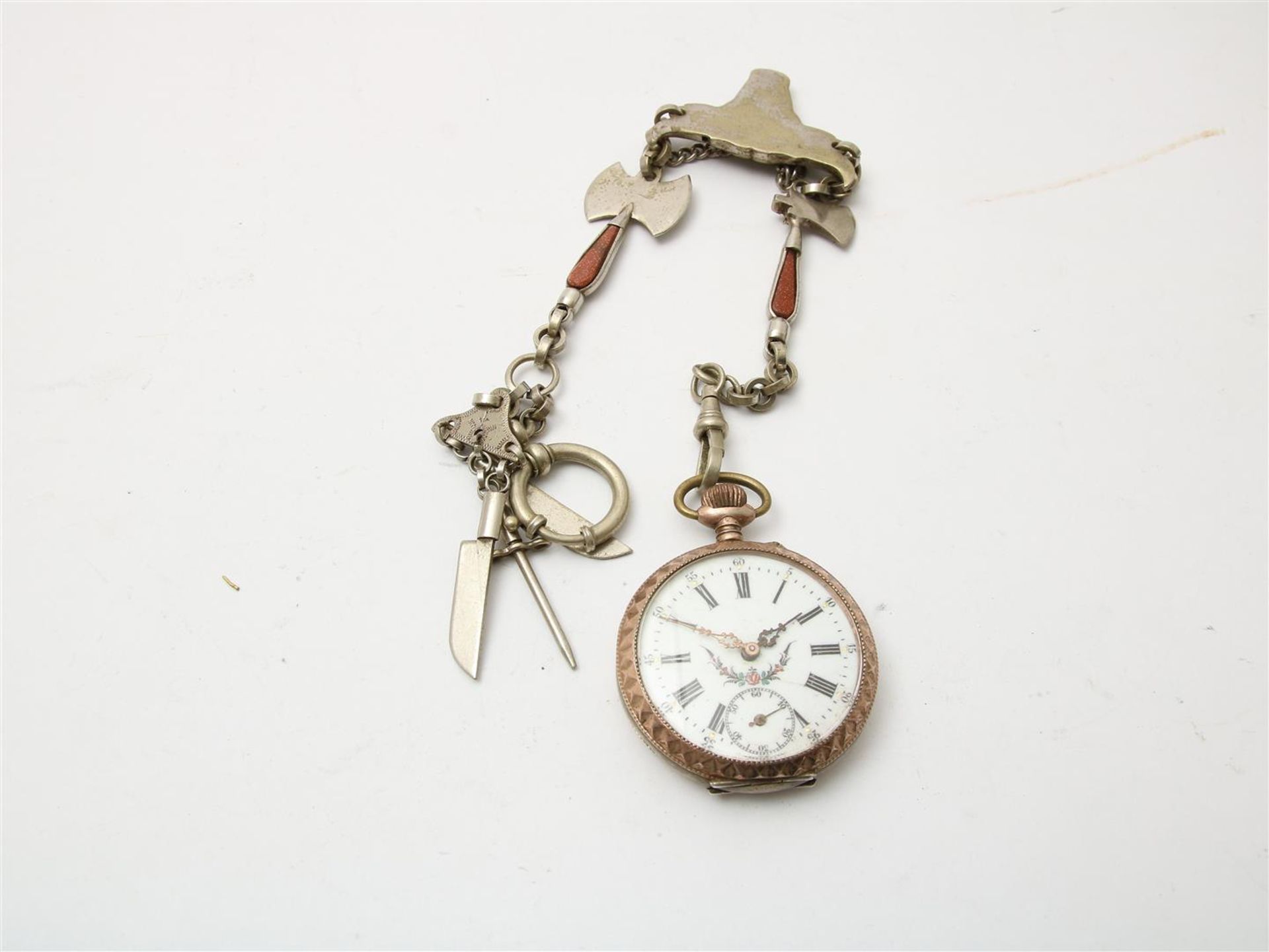 Silver pocket watch with base chain with bull, ax and butcher's tools, diameter 44 cm.