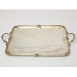 Silver serving platter and plated serving dish