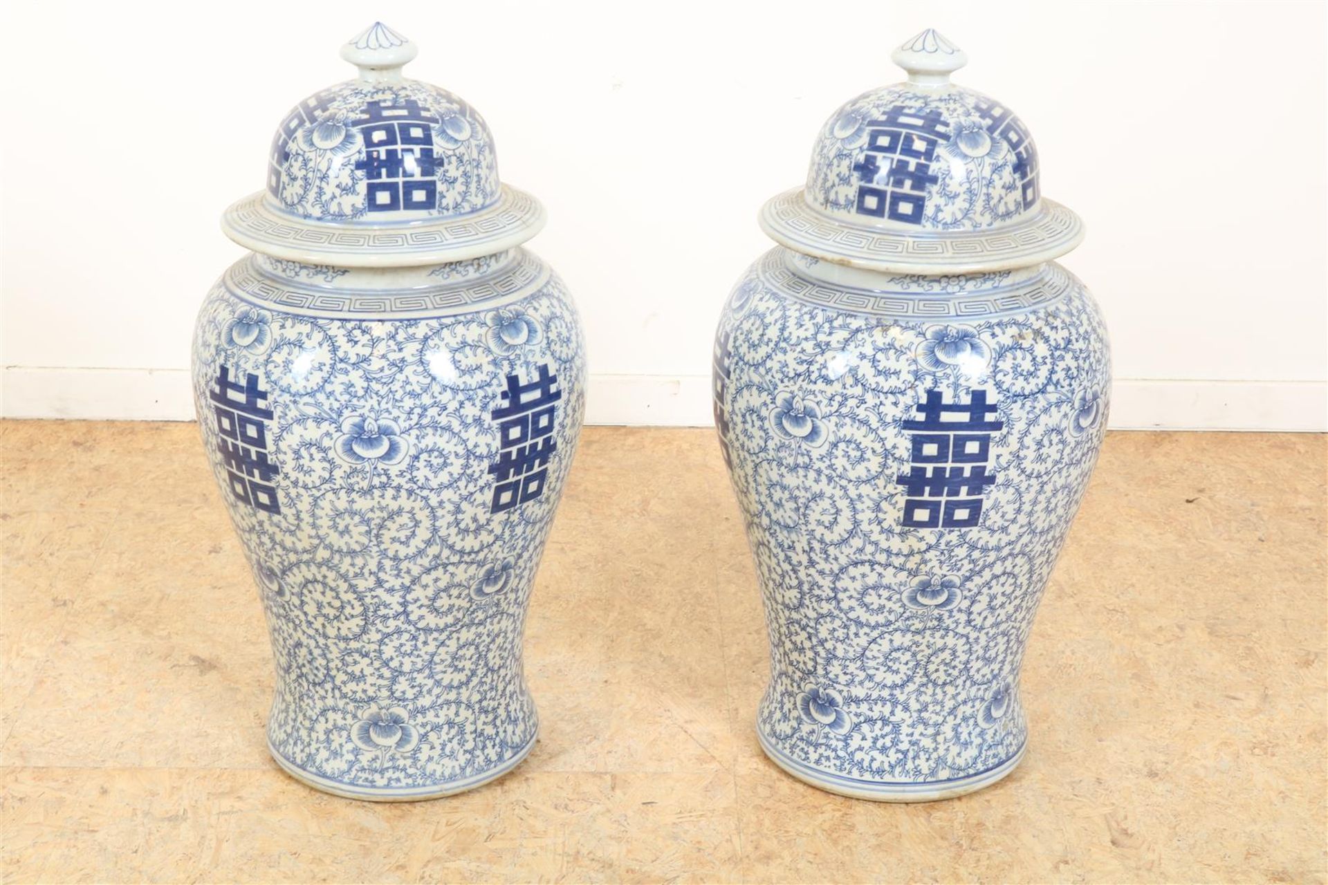 Set of porcelain lidded vases