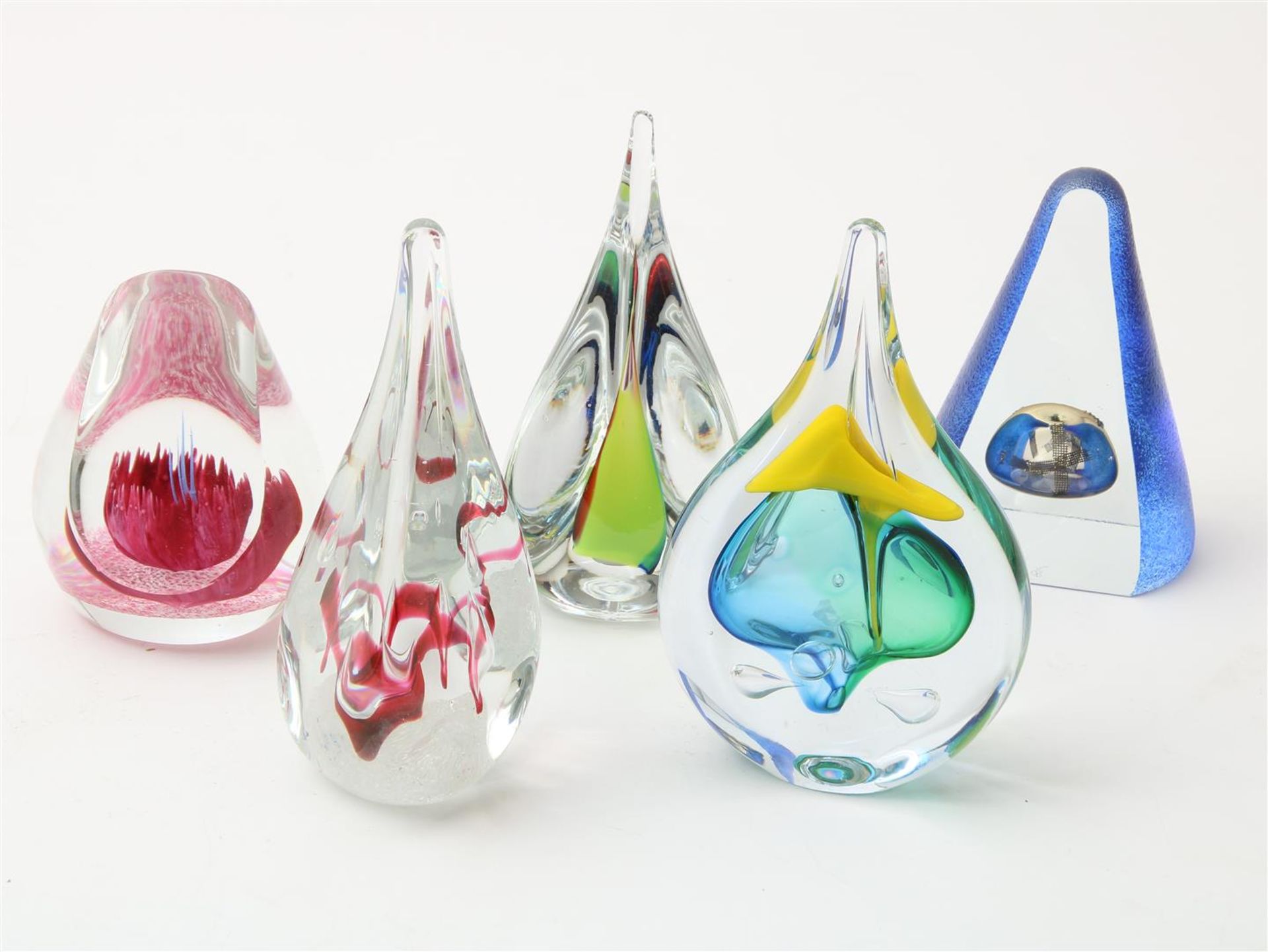 Series of 5 thick glass drop and cone-shaped paperweights, with enclosed decor, signed, among