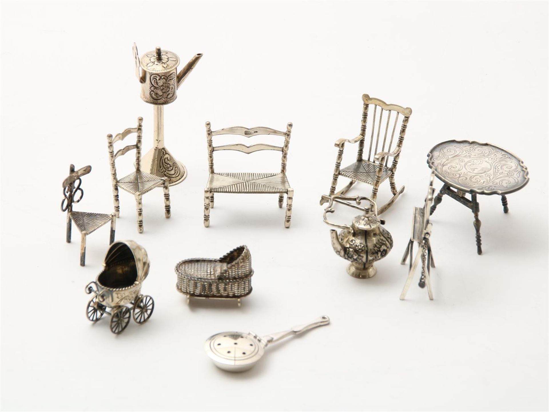 Lot of silver miniatures, including blackboard, snout, rush chair, rocking chair, folding table,