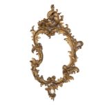 Spiegel in verguld en rijk gestoken houten lijst in Rococo-stijl, 19e eeuw
