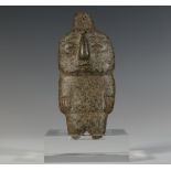 Mexico, Guerrero, Chontal, a motted grey stone figure, possibly 300 - 100 BC;