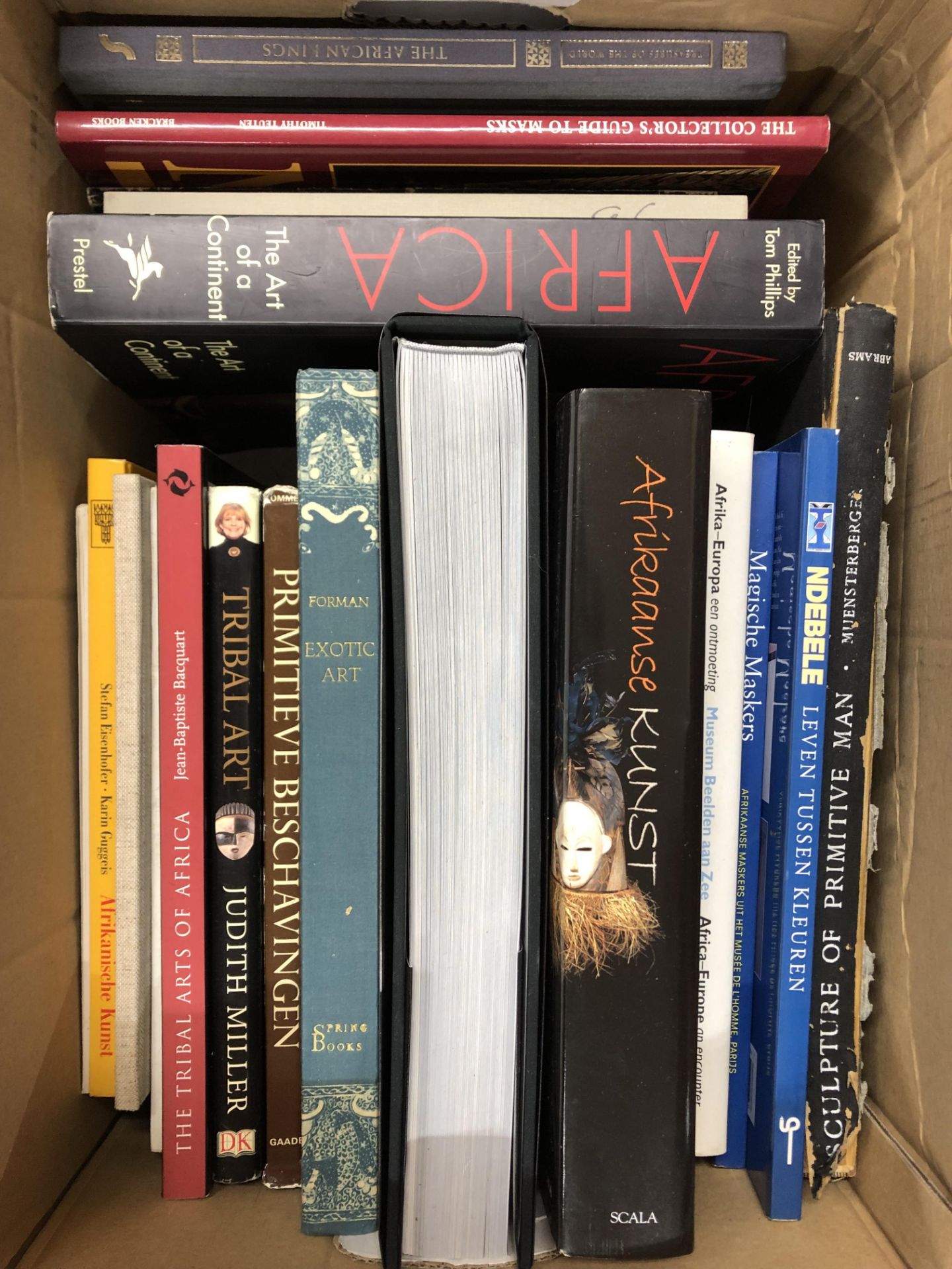 Box with various books on African cultures, arts and religions.