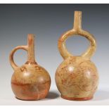 Peru, Moche, two terracotta stirrup spout vessels, 50 - 800 AD
