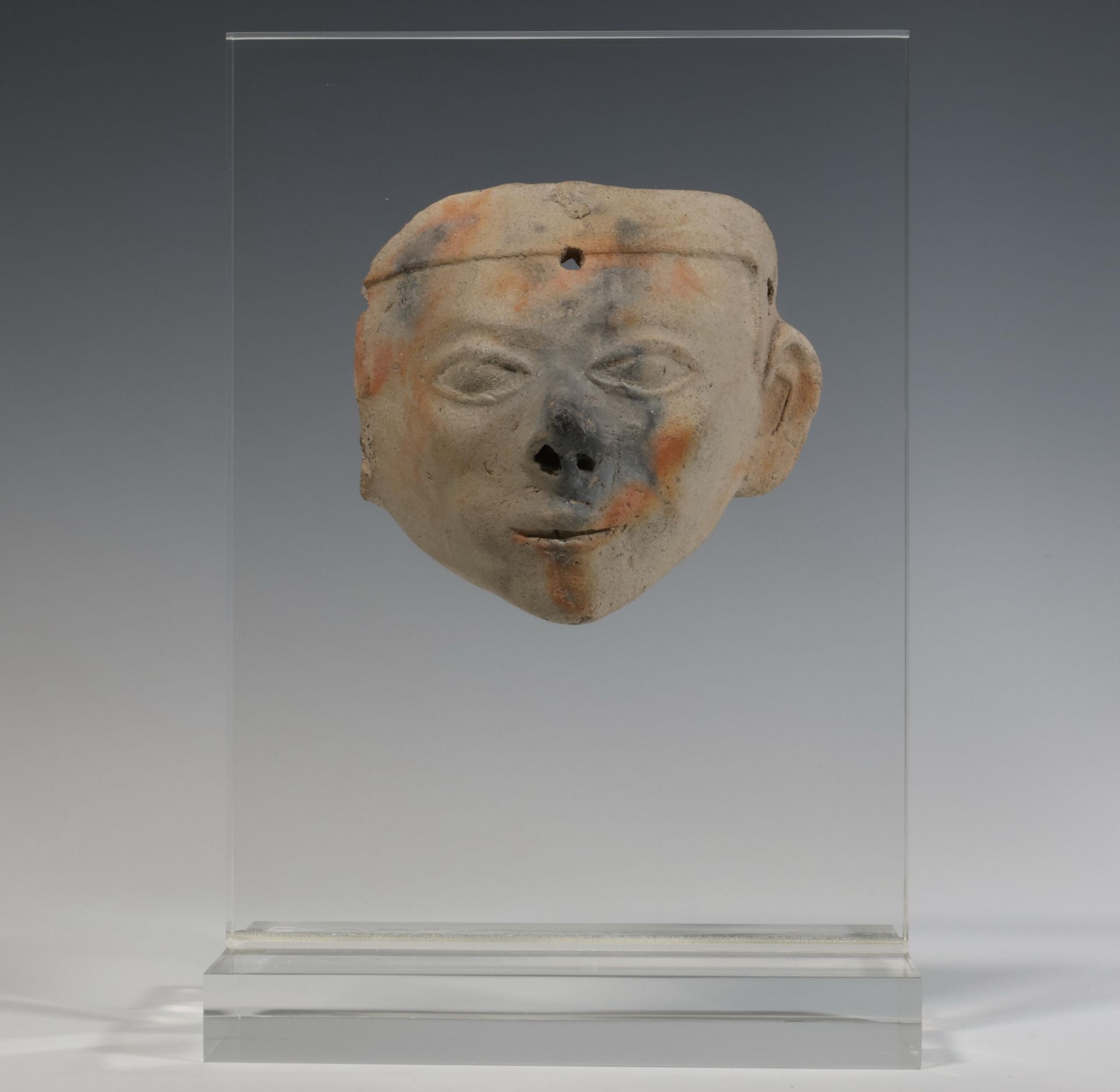 South America, a terracotta mask