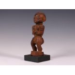 D.R. Congo, a standing male figure