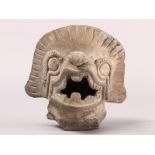 Columbia, a terracotta head of a mythological animal, Tumaco La Tolita, 300 BC - 300 AD.