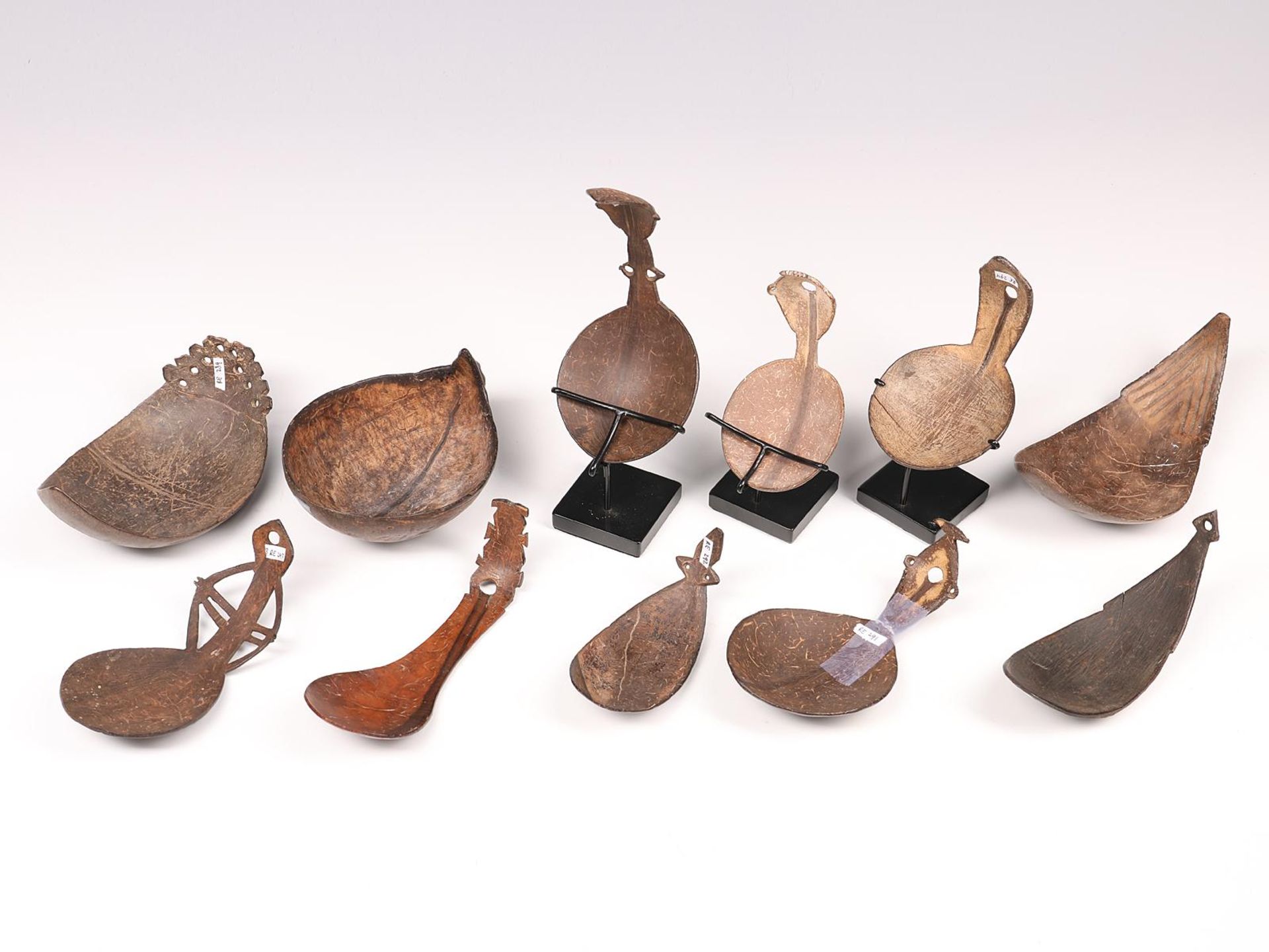 P.N. Guinea, a collection of eleven coconut shell spoons - Image 3 of 5