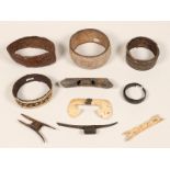 New Guinea, five bone and shell nose ornaments and five arm bands
